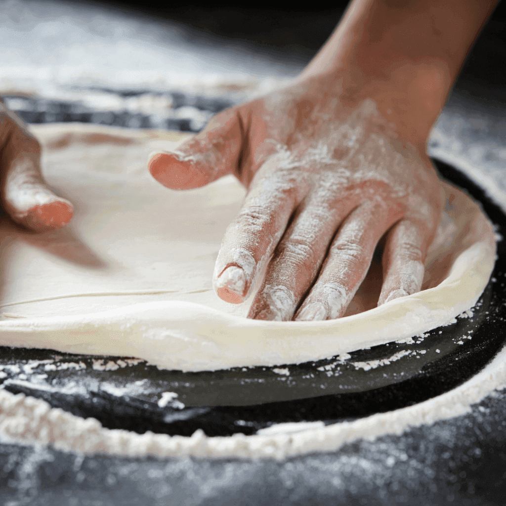 Pùte pizza maison facile : la recette inratable pour une pizza parfaite 4 étirer une pate a pizza
