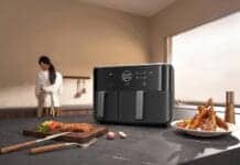 Xiaomi Dual Zone Air Fryer 10 L sur plan de travail, plats croustillants servis.