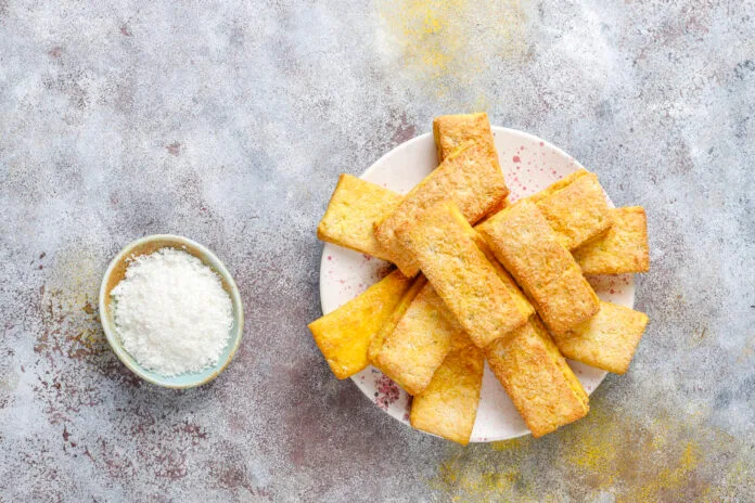 Panisses dorées et croustillantes cuites au air fryer, servies en bâtonnets sur une assiette